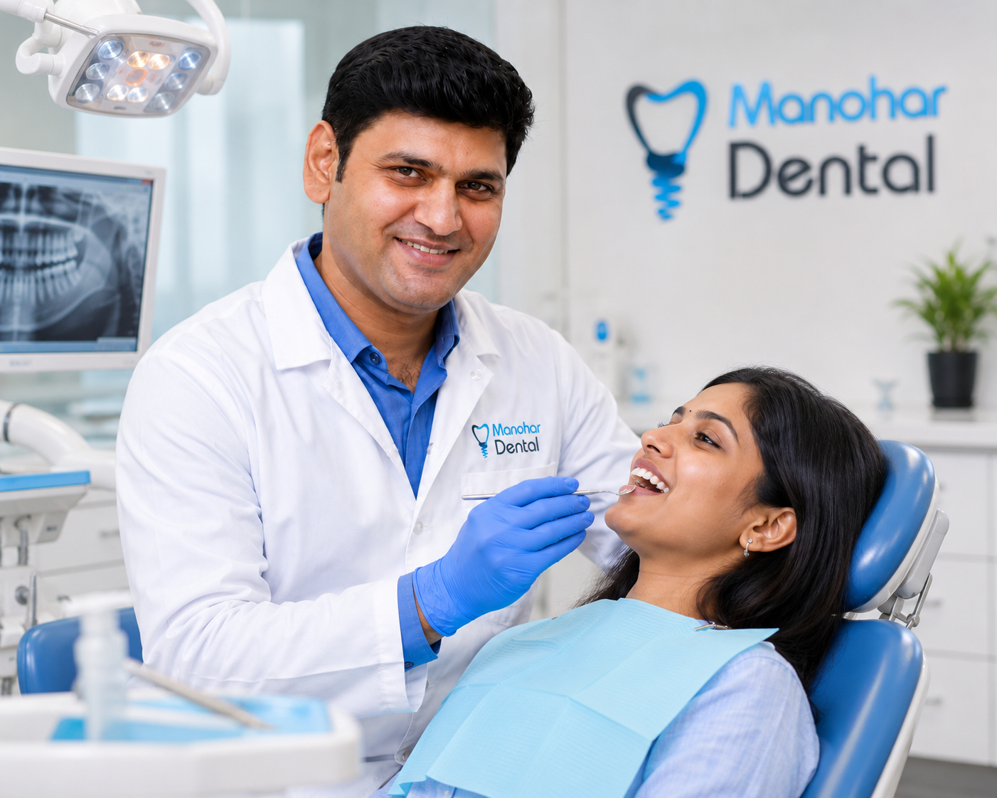 Manohar Dental doctor providing preventive dental care to a patient